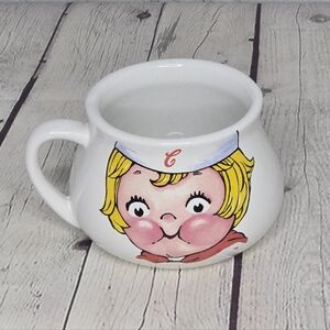 Character Mug with Red and White Design